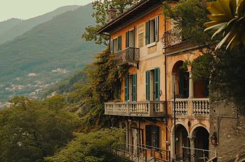 an establishing shot of a quaint mountain villa in Venice, Italy.