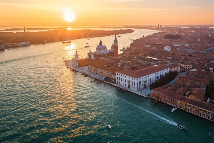 An aerial photograph of the Venetian Lagoon in Italy during daybreak..