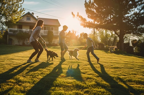 Guests playing at the lawn of a family vacation rental in Italy.