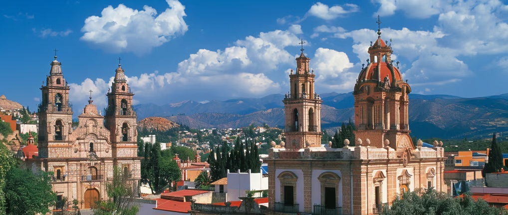 a church with a steeple in mexico