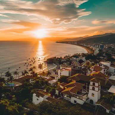 a sunset over a beach with buildings near the shore in mexico a sunset over a beach with buildings near the shore in mexico