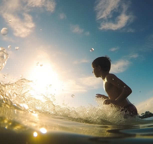 he_underside_of_a_cresting_wave_crashing_over_a_kid