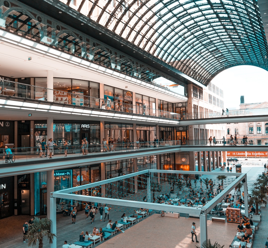 people inside grey metal building