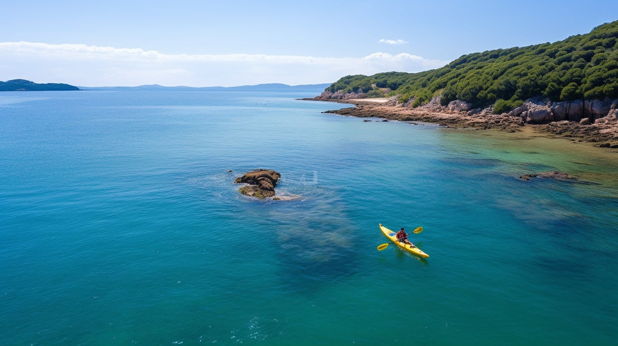 a person in a kayak at maimon beach a person in a kayak at maimon beach