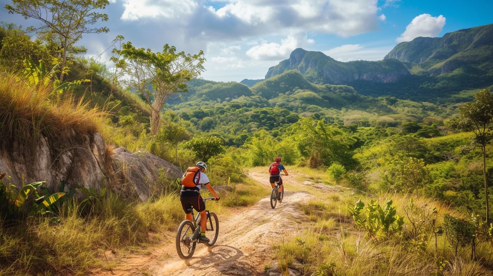 two people riding bikes on a dirt road in puerto plata two people riding bikes on a dirt road in puerto plata