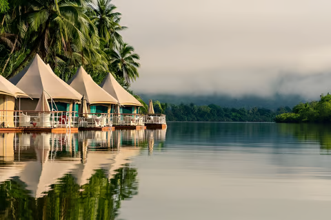 Cottages lined up beside the lake in koh kong, cambodia Cottages lined up beside the lake in koh kong, cambodia
