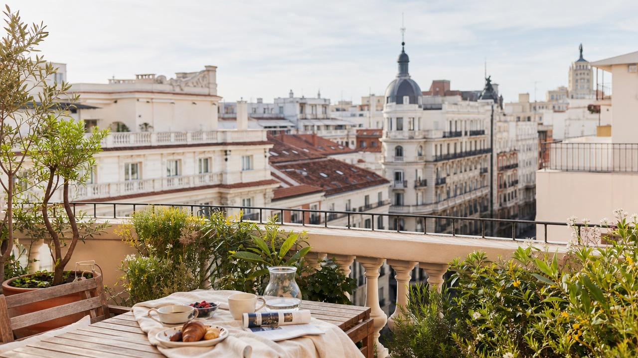 Bright rooftop terrace overlooking Madrid during a relaxed city stay.