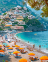 Swimmers and sunbathers at Positano Beach on the Amalfi Coast in Italy